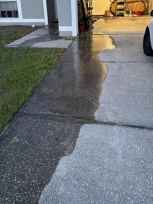 Water spewing out of garage and front door