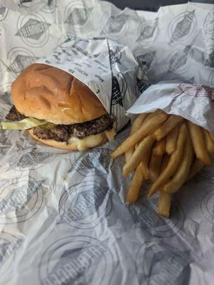 The half pound burger with extra $0.99 Swiss cheese