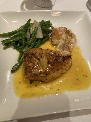 Chilean Sea Bass Served With A White Wine And Lemon Saffron Sauce