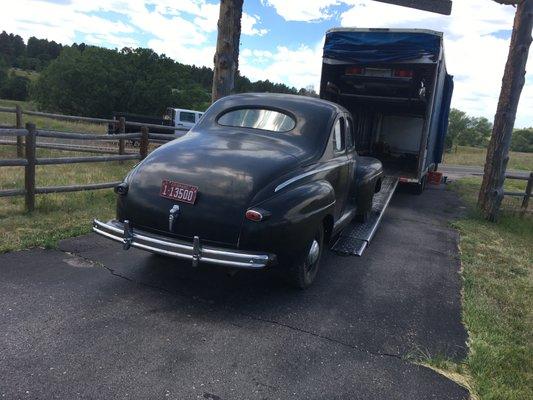 Loading a classic car in a Double-Decker enclosed trailer.