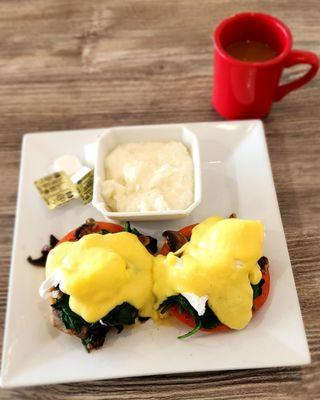 Florentine eggs Benedict with a biscuit and grits with a coffee