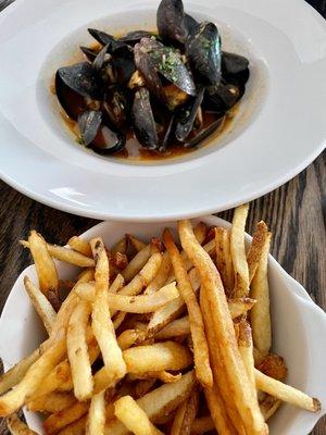 MOULES-FRITES HORTENSE -- SPICY NDJUIA, GARLIC CONFIT, FRESH HERBS