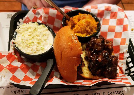 Burnt End Sandwich with Cole Slaw and Sweet Potato Soufflé at Shiver's