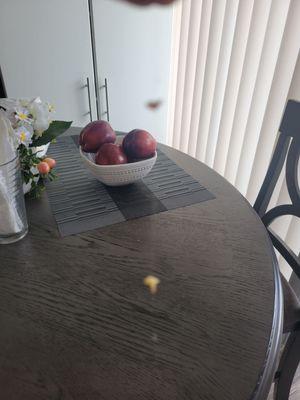 A long blonde hair stretched out on the table.