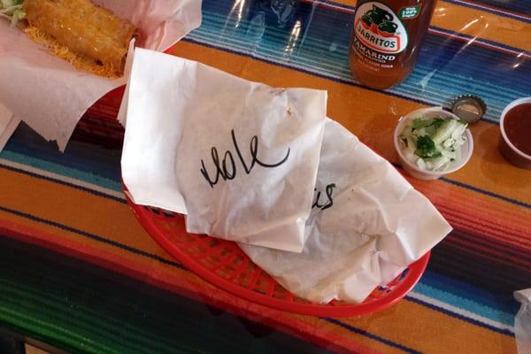 Order of gorditas: mole and rajas y queso - plus a side of flautas