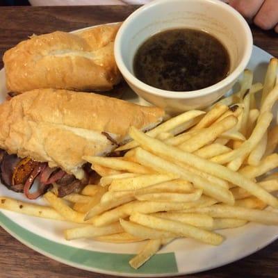 Philly Cheese steak with shoestring fries.