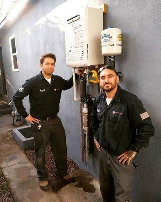 Mike and Kyle live on the job installing a tank less water heater