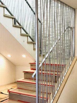 Contemporary chrome stair railing.