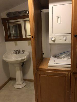 Bathroom with washer and dryer