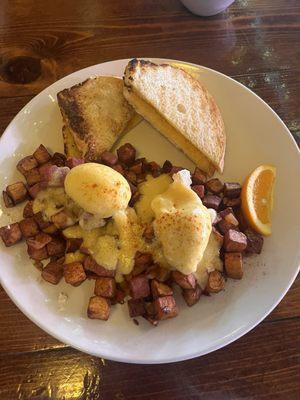 Poached eggs, potato's, sourdough bread with beef! So savory and perfectly cooked!