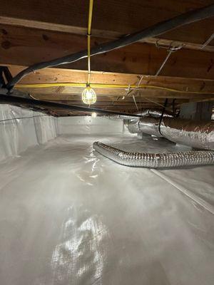 Crawlspace restoration with an encapsulation.