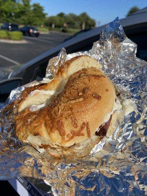 Bacon egg and cheese on Asiago bagel with garlic and herb cream cheese