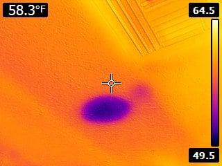 Thermal imaging found water in the ceiling.   The ceiling looks normal to the naked eye.