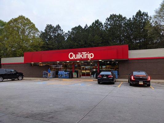 Outside the convenience store. Storefront. Exterior shot. This is an older generation QT. Not Generation 3 (Gen 3).