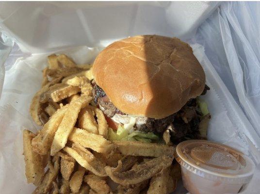 Mushroom Swiss Burger/w Turkey Bacon and Home Fries and drink.