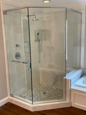 Three sided shower with beveled glass and Guardian glass protector.