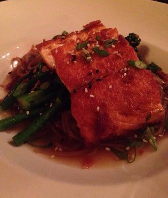 Salmon bowl with broccolini and soba noodles in a bacon broth