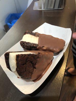 "East Hampton" ice cream sandwich cut in half and dipped in milk chocolate. So delicious!!