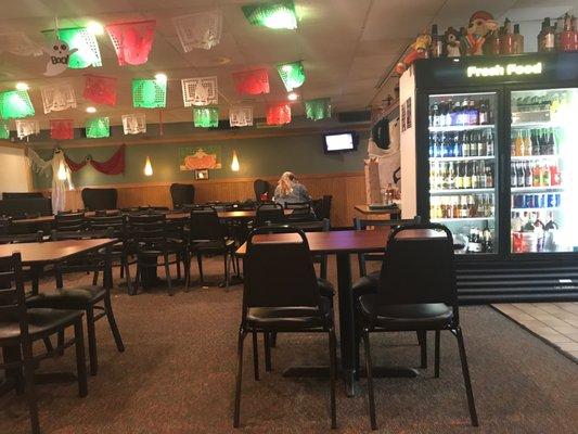 Assorted bottled beers and Mexican soft drinks and general seating