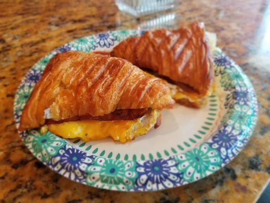 Deluxe Breakfast Sandwich - Sausage Bacon Croissant w/egg and cheddar cheese