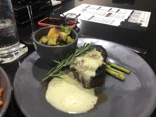 Bone in Tenderloin with Oscar Sauce Asparagus and Brussel sprouts.