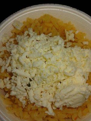 Rice with tomato, corn, peas, and queso fresco.