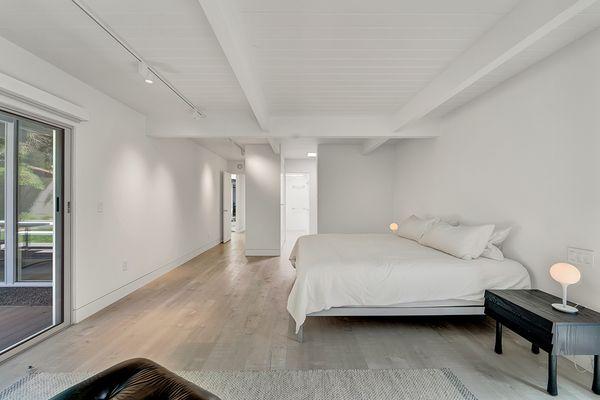 Peaceful modern sleep space remodel by Keycon