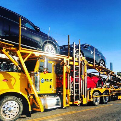 Car carrier transporting vehicles