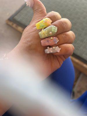 My Easter nails done by phill I love them great nail shop never had any problems with my nail care from this nail shop