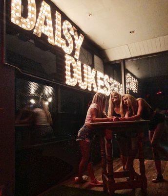 Daisy Dukes is located on the second floor with a mixture of music ranging from Country to Hip Hop.