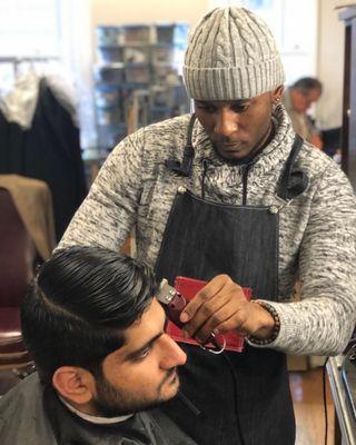 Alan (the owner) stopped by to check on me and snapped this fresh action shot of Travis giving me a cut.