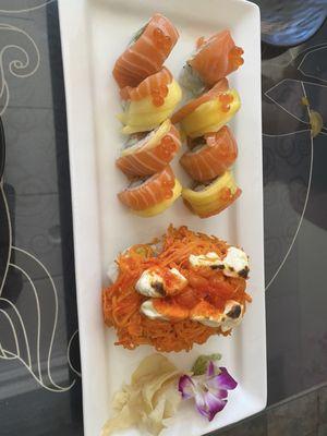 Dynamite  role (cooked cream cheese on top) and salmon lover (mango on top)