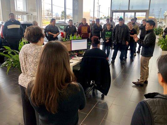 All-staff meeting at Crestmont Cadillac.