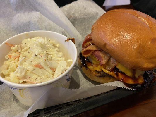 Three little pigs smash burger with side of coleslaw