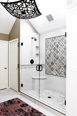 Tile shower with corner seat in Portland.