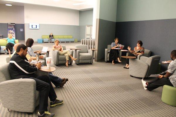 Collaboration areas throughout the building serve as lunch spots, meeting space, individual workspace, or somewhere to just relax.