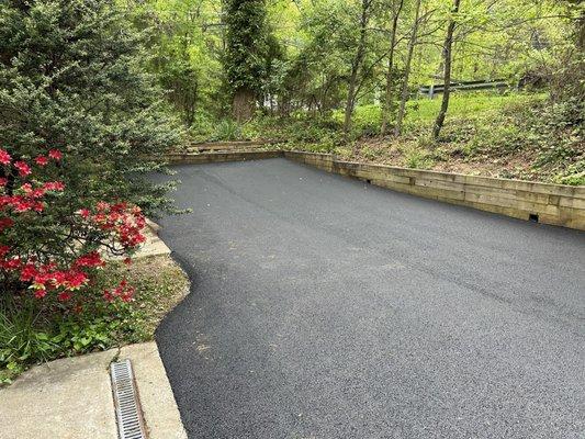 Our new driveway by Metropolitan.  Great job.  If you read this (owners) please tell your team that they're excellent