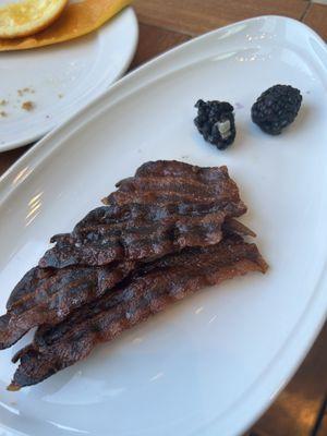 Burnt bacon and moldy blackberries