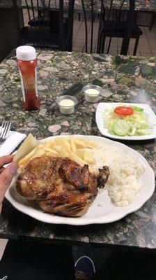 1/2 Pollo with yuca, rice and salad. Delicious.