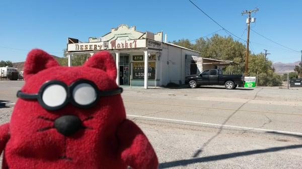 Catbert visits Desert Market (and buys water).