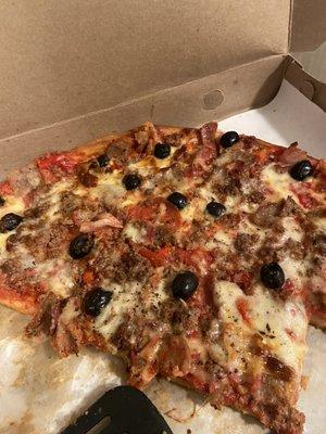 Large with (whole) olives, roasted red peppers, sausage, pepperoni, bacon,  & hamburg