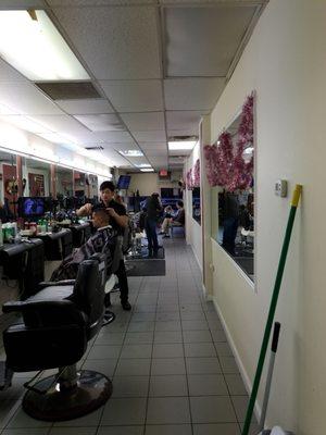 3 talented barbers at Alex Barber shop getting busy