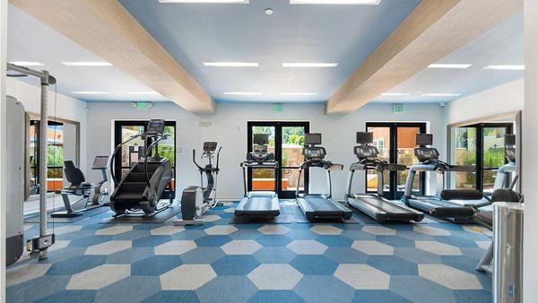 Apartment community 24-hour fitness center at Griffis South Bay in Milpitas, California.