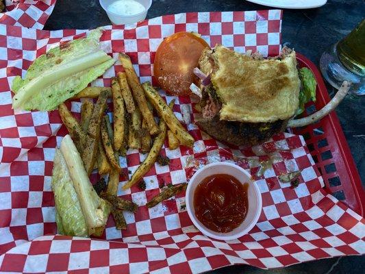 Mushroom Swiss burger with fresh cut French fries. The bun is sweet and delicious.