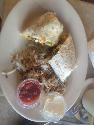 Breakfast burritos, harsh brown, salsas and sour cream.