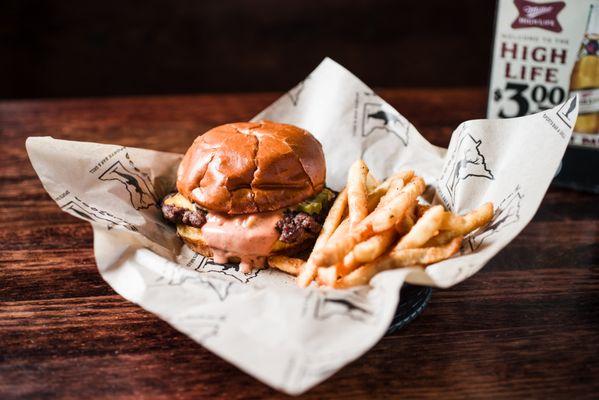 Wild Hour Special - Smash Burger & Fries. 1/3 pounder with american cheese, pickles, sweet mayo, on a toasted brioche bun.