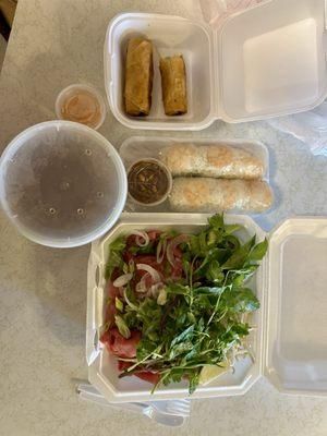 With tax. $22. Large beef pho two spring rolls two fried rolls. Sauce is perfect. Tons of meat. Tons of sprouts and herbs. Amazing.