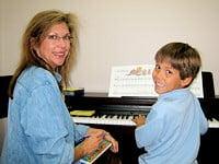 Pam P. and piano student