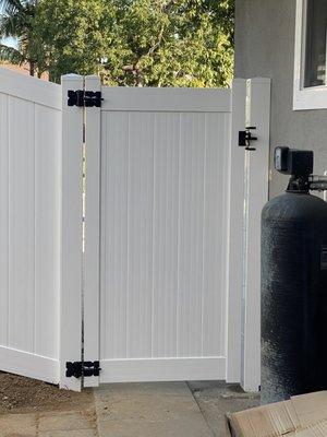 Backyard view of new vinyl gate install.