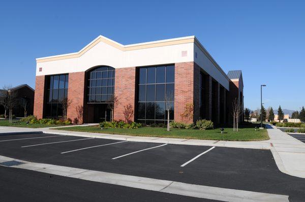 Asphalt Parking Lot For Office Building With Parking Lines